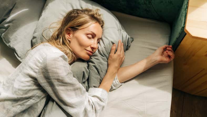 Young caucasian woman is sleeping. The concept