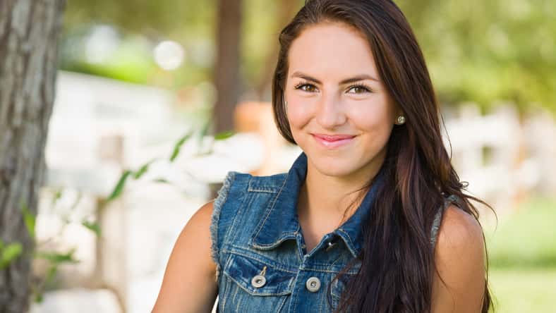 Attractive Mixed Race Girl Portrait Outdoors.