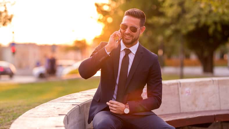 A handsome young businessman sitting on a