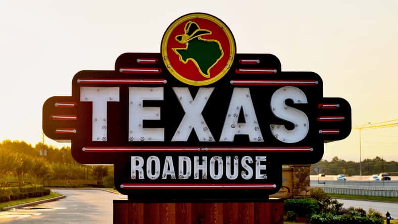 Texas Roadhouse restaurant sign by freeway company