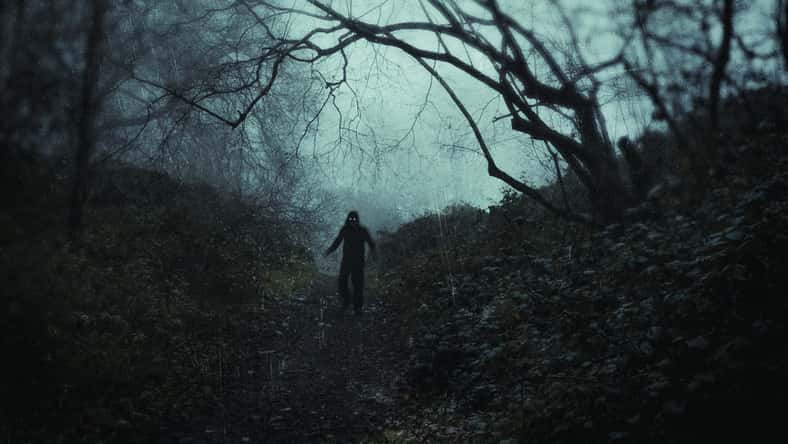 a scary, haunting figure with glowing eyes.