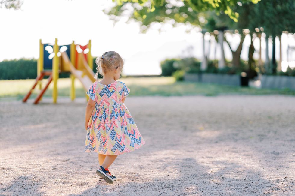 a little girl on a playground
