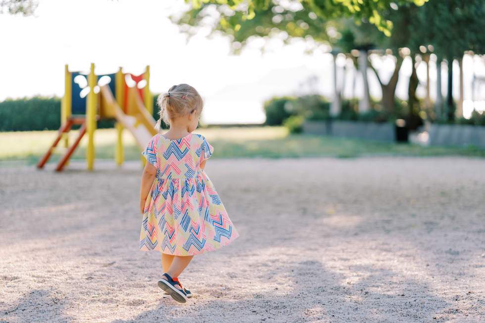a little girl on a playground