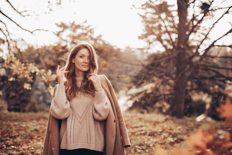 Beautiful girl in autumn park