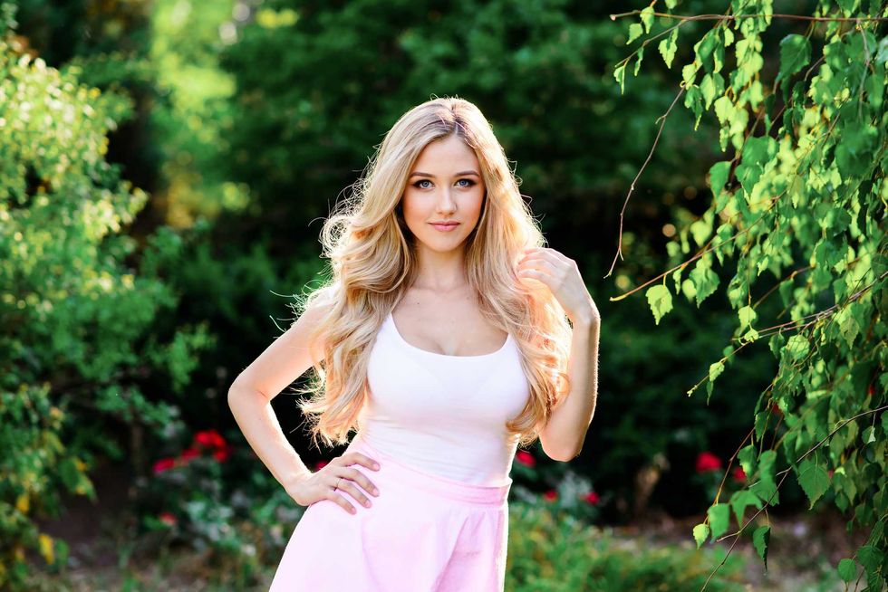 beautiful girl in the garden on a sunny day