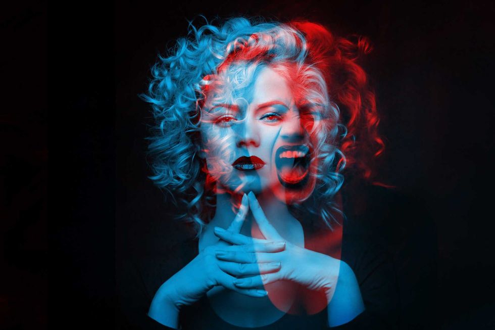 Calm and angry girl. Double color exposure.