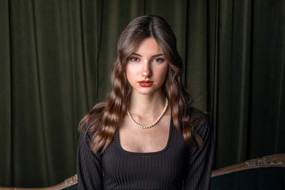 Close up portrait of a young beautiful woman, studio indoor