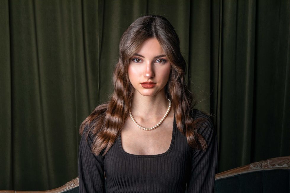 Close up portrait of a young beautiful woman, studio indoor