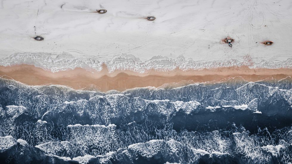 Fishing boats on the Baltic Sea in winter, aerial view, Poland