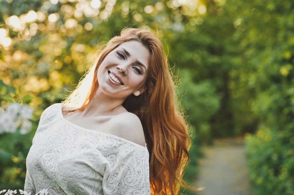 Girl with long red hair.