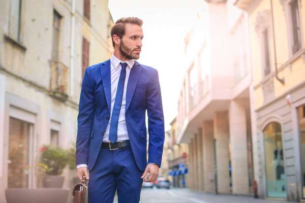 Handsome guy walking elegantly