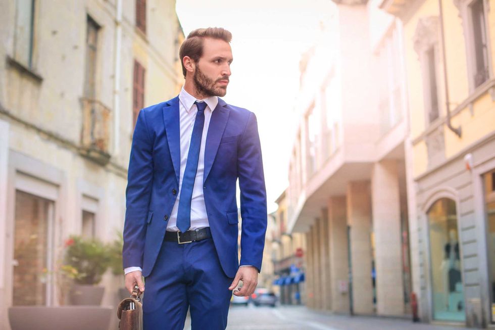 Handsome guy walking elegantly