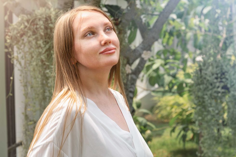 portrait of a cute young woman in the garden