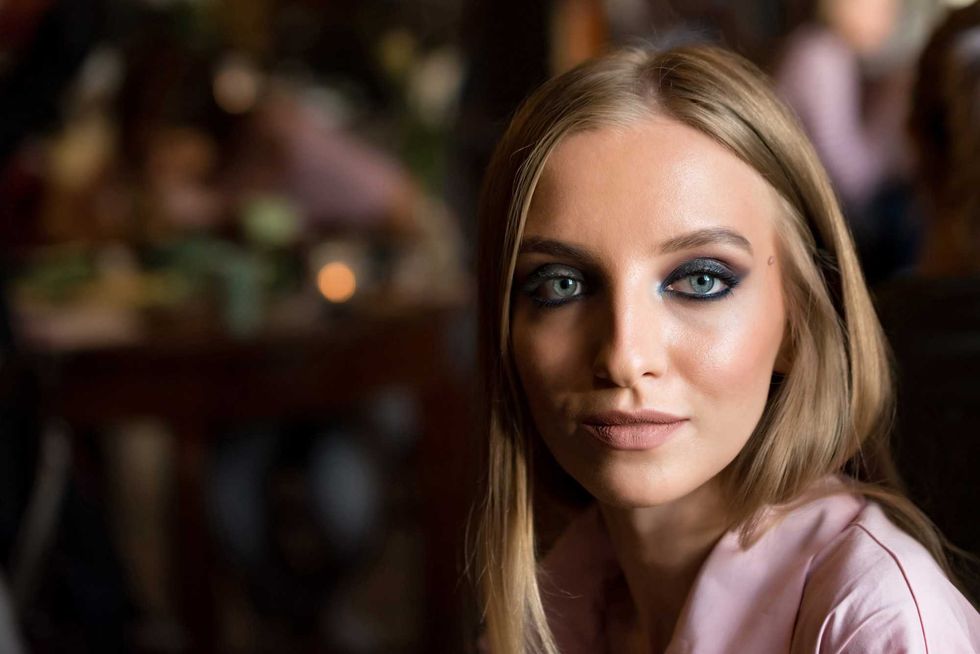 Portrait of beautiful blonde model with bright makeup