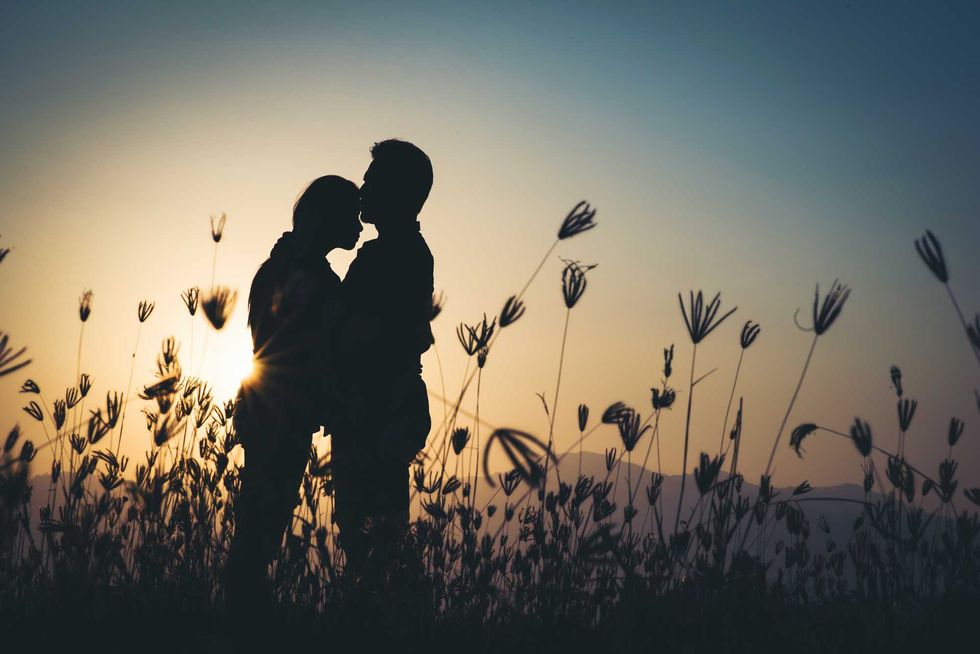 silhouette of Couple in love silhouette during sunset