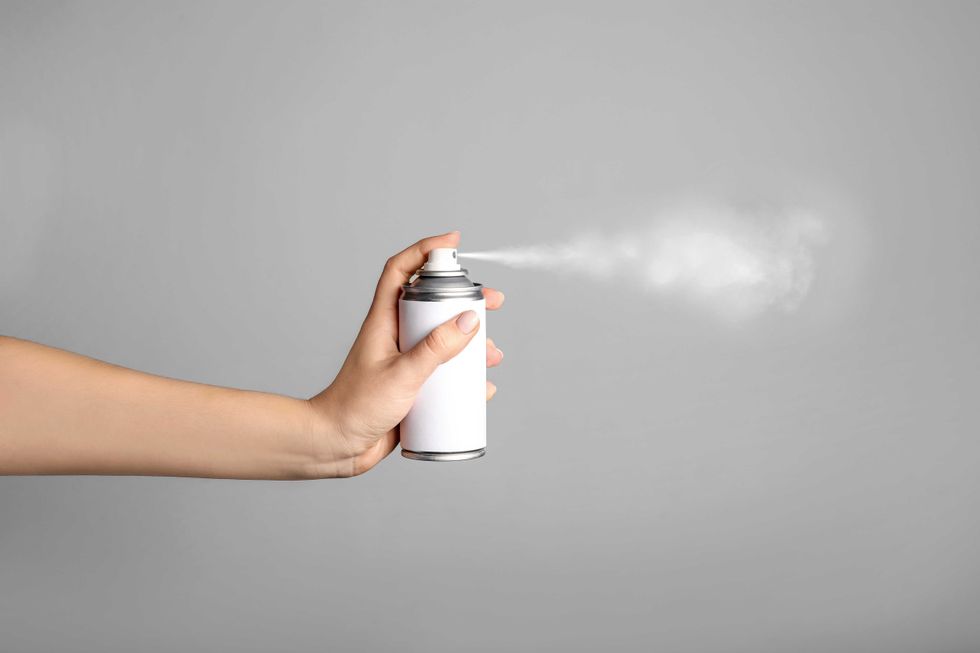 spraying child