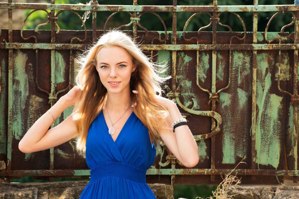 teen girl in a blue dress