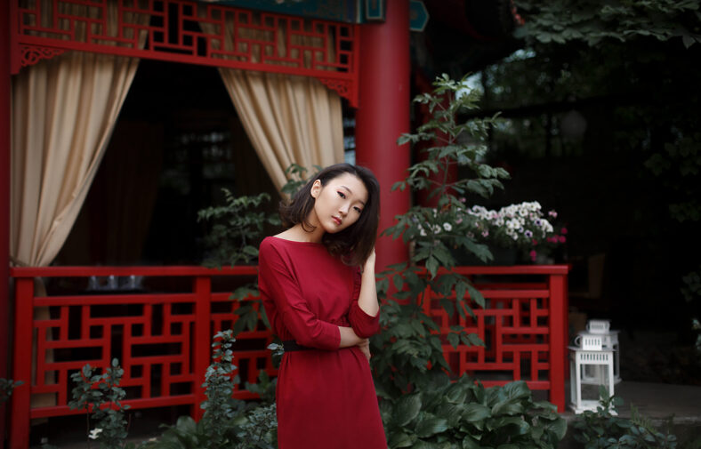 asian woman in red dress