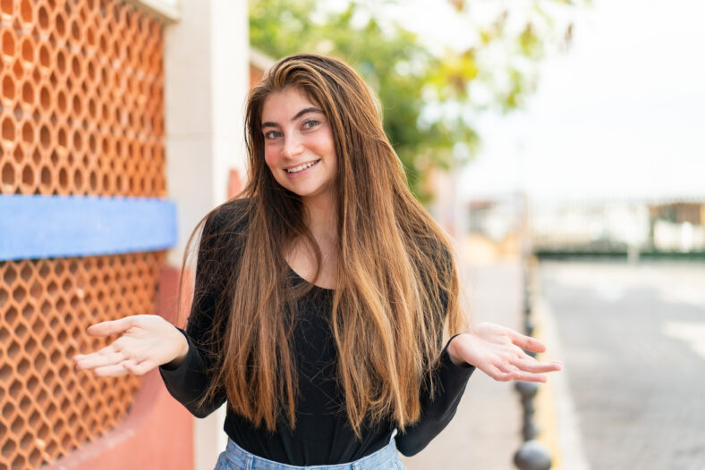 Young pretty caucasian woman smiling