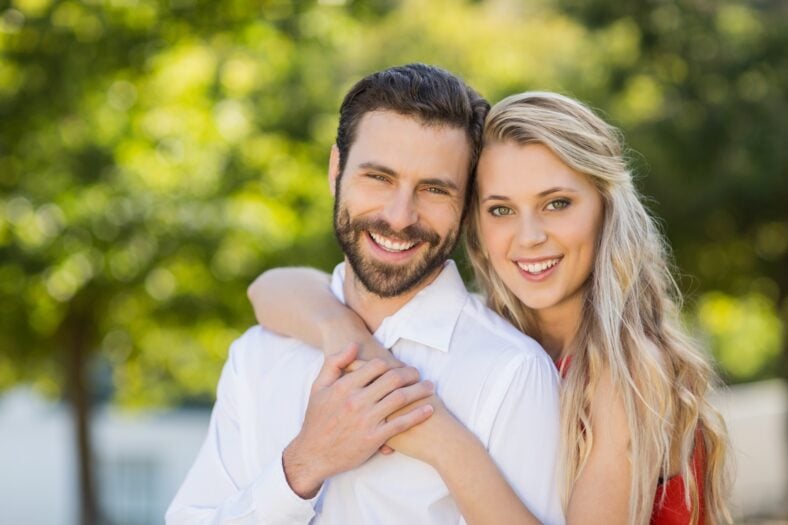 Happy couple hugging each other