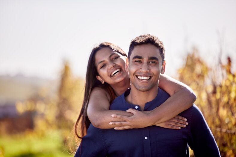 Shot of a young couple having a date on a wine farm.