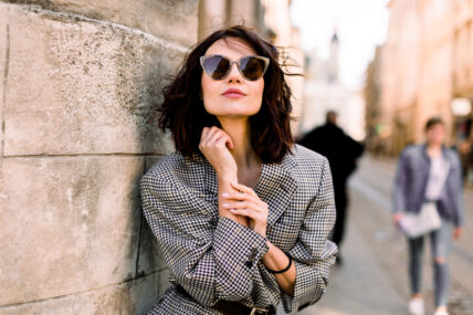 Beautiful brunette young woman wearing jacket and