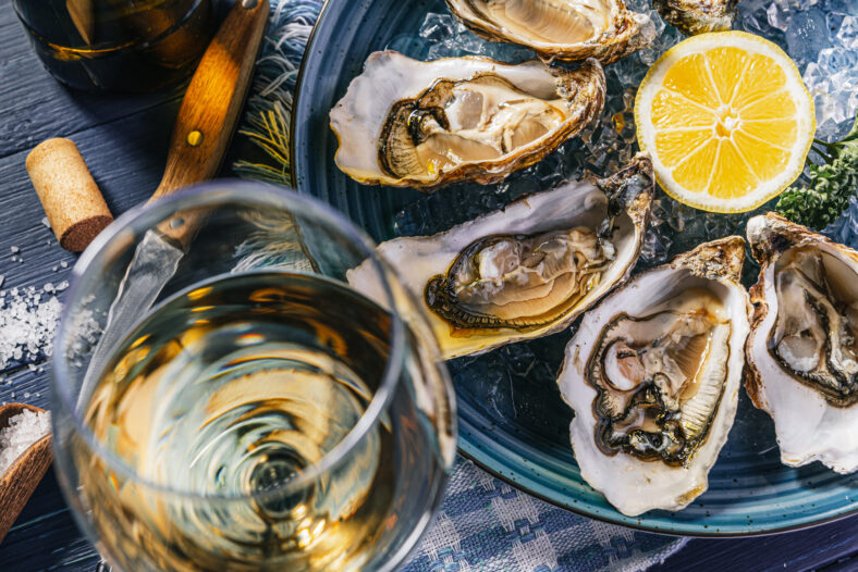 Fresh oysters with lemon ice and white wine.