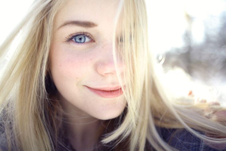 Beautiful young blonde teen girl