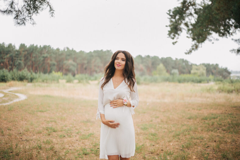 Pregnant woman, relax and enjoy life in nature