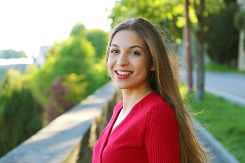 Beautiful smiling woman in the park