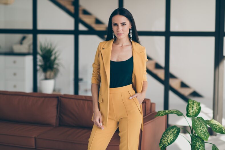 Portrait of her she nice-looking attractive glamorous lovely content, lady model new owner project designer in modern style interior glass open space room flat house indoors