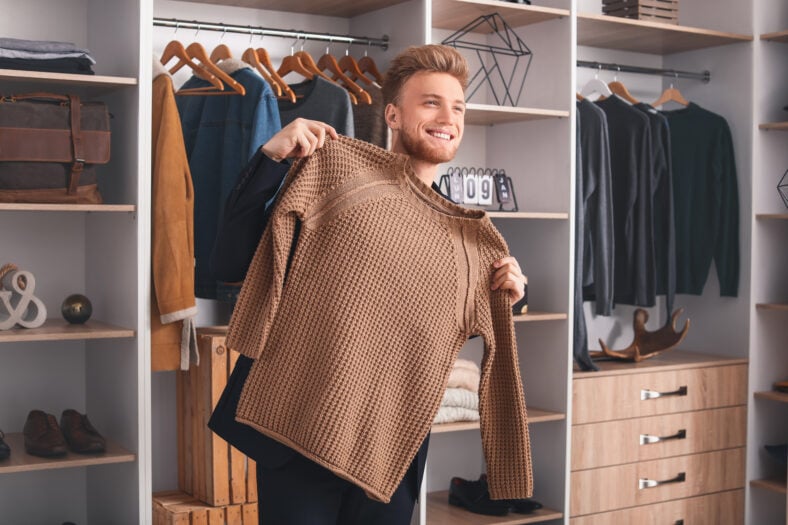 Handsome man with stylish clothes in dressing room