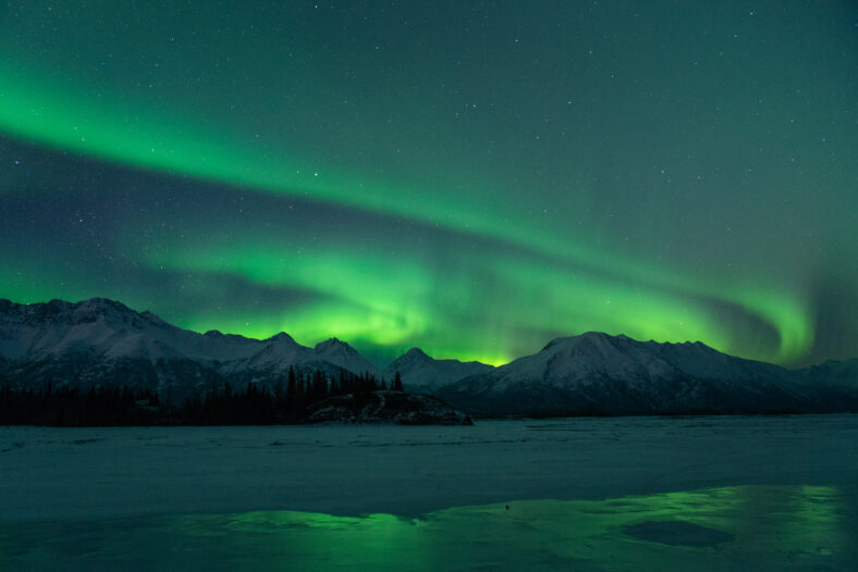 Aurora sky in Alaska with strong Northern Lights