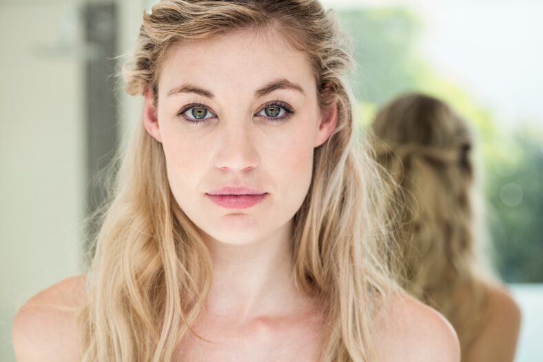 Portrait of confident young woman