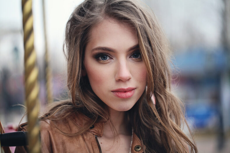 Young female face, outdoors portrait