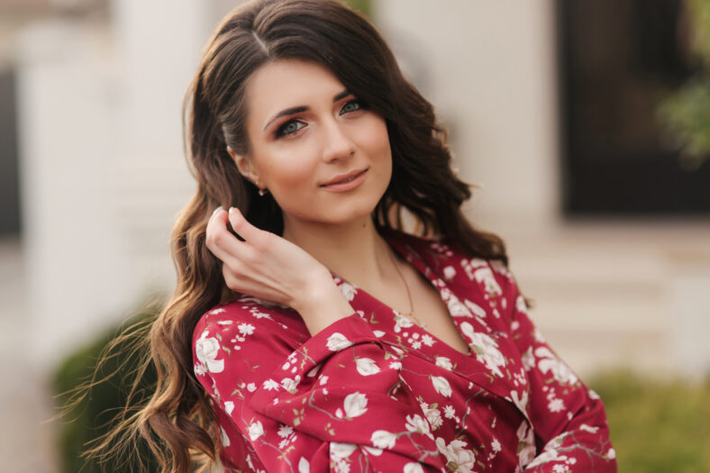 Portrait of brunette model. Girl with hairstyle and makeup.