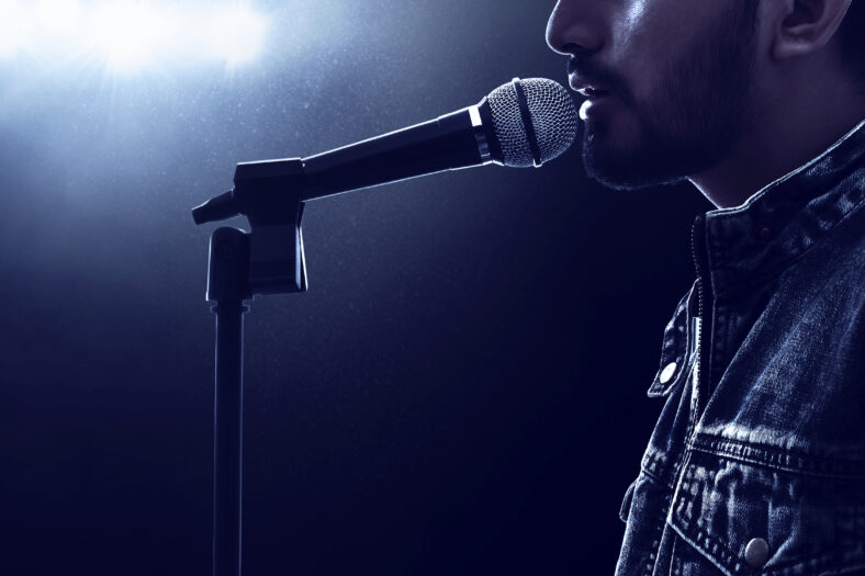 Singer singing with microphone
