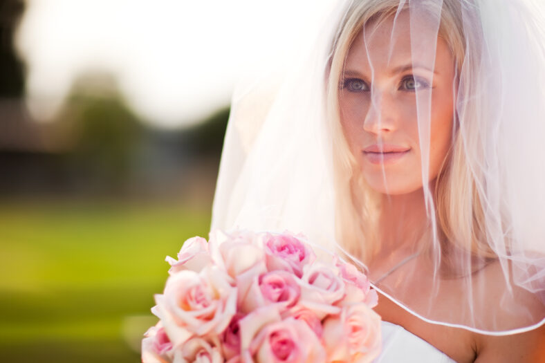 A shot of a beautiful caucasian bride outdoor