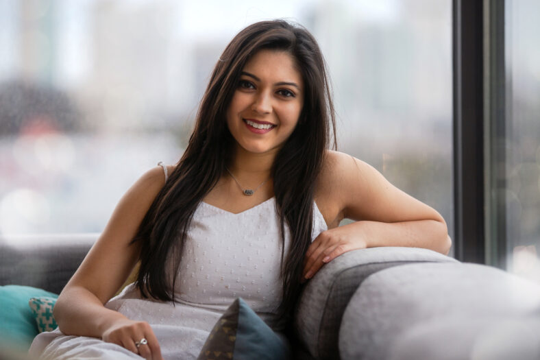 Beautiful casual headshot lifestyle portrait, home living, relaxing, leisure, comfortable modern apartment in the city