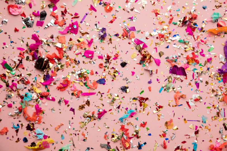 Bright colourful party sparkling party confetti background