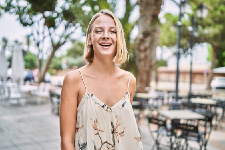 Young beautiful woman smiling confident outdoor