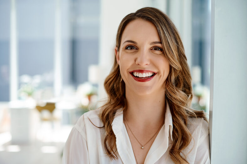 Portrait of an attractive young businesswoman standing inside her office.