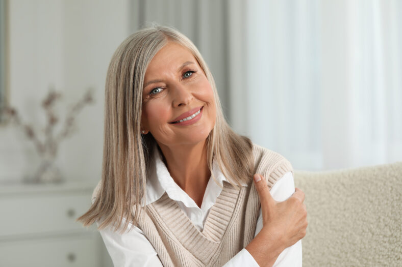 Portrait of beautiful middle aged woman at home