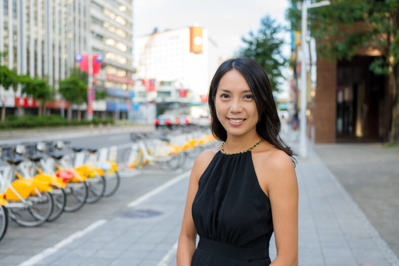 Beautiful woman smile to camera at outdoor