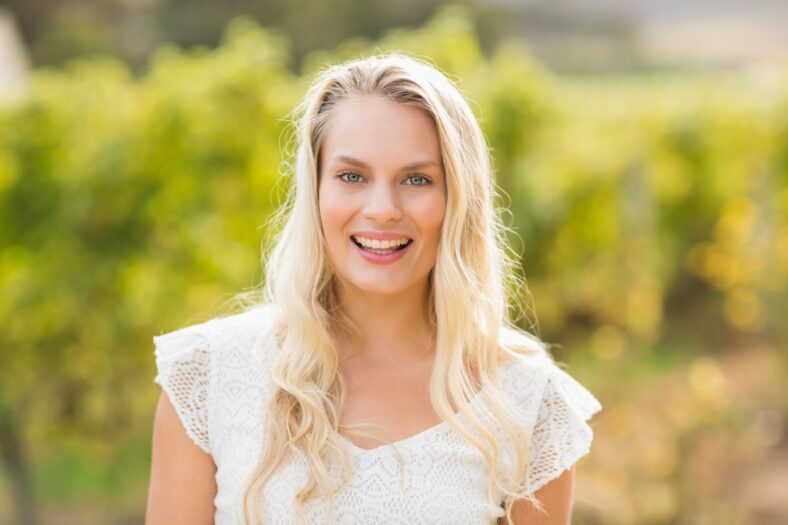 Pretty blonde woman looking at the camera