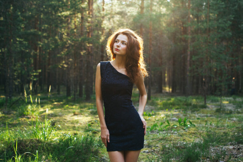 redhead girl in the forest