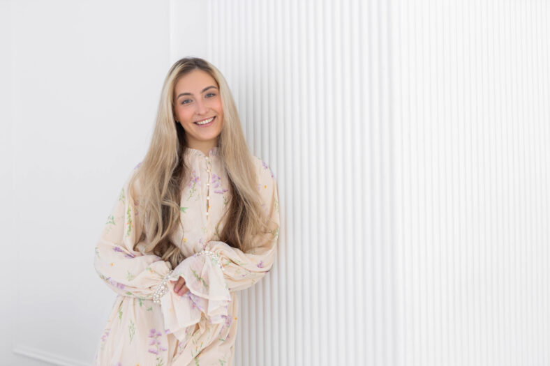 cute caucasian young happy female in light dress
