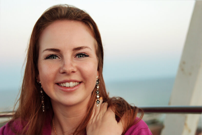 portrait of happy red hair girl