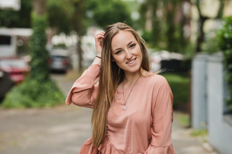 beautiful woman with shopping bags on the street