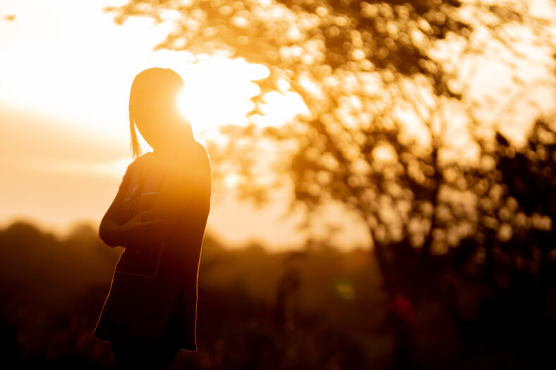 silhouette women with sunlight